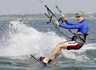 Illustration for article titled John Kerry Actually Pretty Good At Windsurfing Now